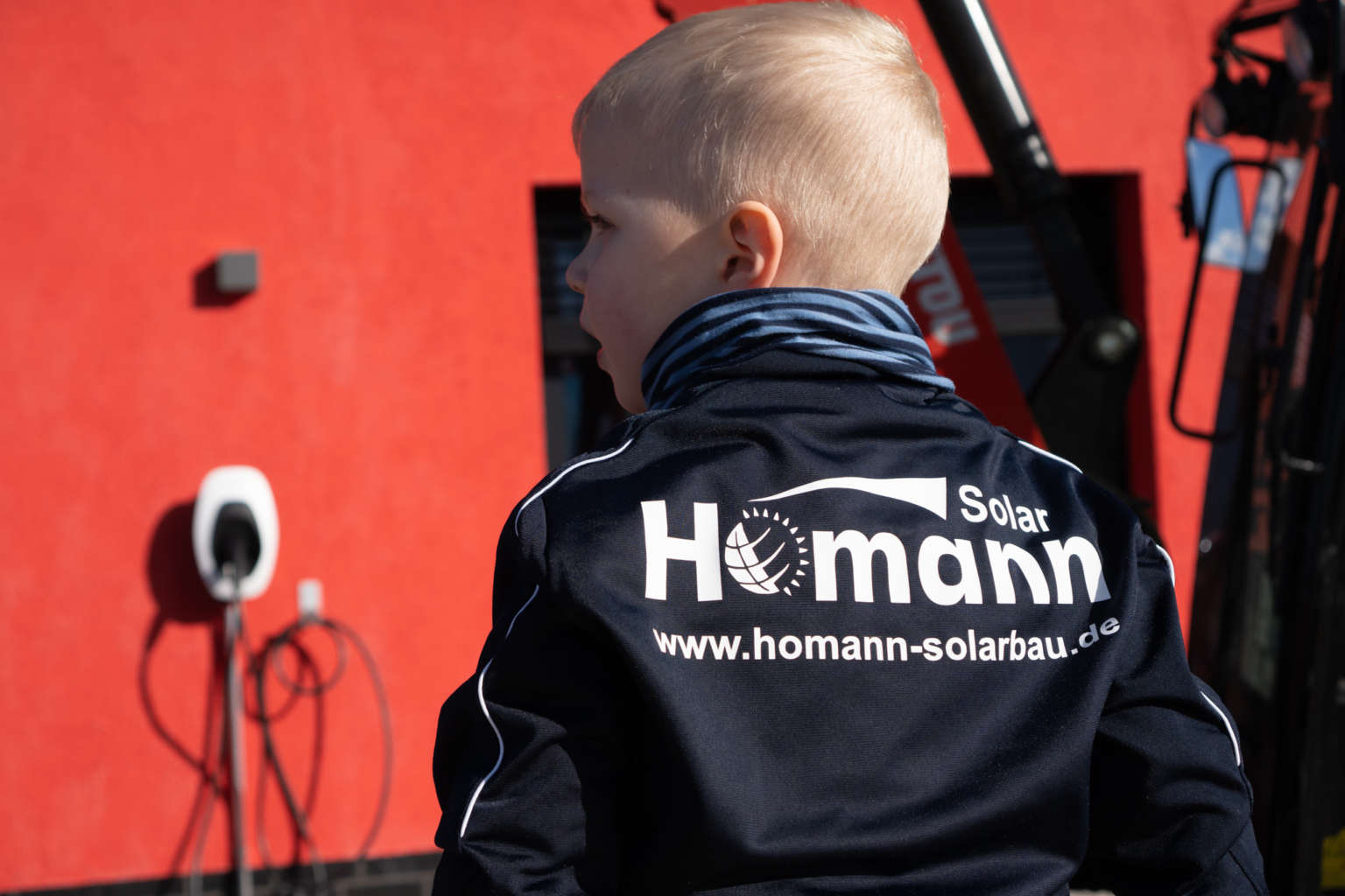 Das Homann-Team in Arbeitskleidung